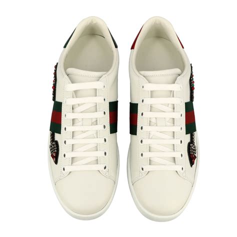 gucci white sneakers arrow|classic white Gucci sneakers.